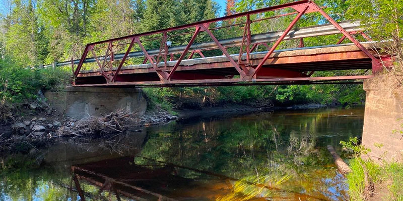 The old McColl's bridge pictured on a sunny day.